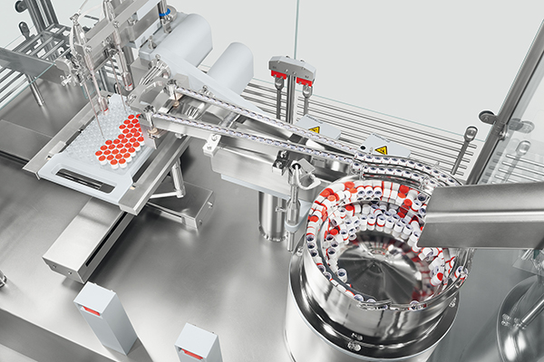 Aseptic filling and closing machine for ready-to-use vials with RayDyLyo caps